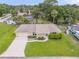 Charming home with a well-kept lawn and manicured landscaping at 125 Orange Ave, Edgewater, FL 32132
