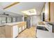 Bright kitchen featuring an island, modern appliances, and ample counter space at 125 Orange Ave, Edgewater, FL 32132