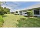 Wide lawn and well maintained grounds in back of home at 1442 Carlow Cir, Ormond Beach, FL 32174