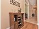 Cozy home bar area, perfect for entertaining guests, complete with wine storage and decorative accents at 1442 Carlow Cir, Ormond Beach, FL 32174