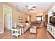 Inviting living room featuring hardwood floors, comfortable seating, and an open floor plan at 1442 Carlow Cir, Ormond Beach, FL 32174