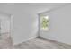 Bright bedroom with modern flooring and a window with natural light at 15190 Cr-565A, Clermont, FL 34711