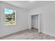 Bedroom with a closet, modern flooring and a window with natural light at 15190 Cr-565A, Clermont, FL 34711