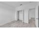 Bedroom with a closet, modern flooring, and neutral walls at 15190 Cr-565A, Clermont, FL 34711