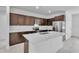Contemporary kitchen with a large island, stainless steel appliances, and sleek, modern finishes at 15190 Cr-565A, Clermont, FL 34711