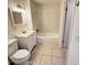 A view of a bathroom including the sink, toilet, and bathtub at 1600 Big Tree Rd # L1, South Daytona, FL 32119
