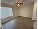 This bedroom has a window and laminate flooring at 1600 Big Tree Rd # L1, South Daytona, FL 32119