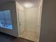 Bright entryway featuring tile flooring, front door, and coat closet at 1600 Big Tree Rd # L1, South Daytona, FL 32119