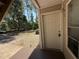 A front door with an outdoor landscape view adds curb appeal to the property at 1600 Big Tree Rd # L1, South Daytona, FL 32119