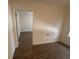This hallway has laminate flooring at 1600 Big Tree Rd # L1, South Daytona, FL 32119