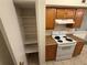 Kitchen Pantry storage with Oven and Range at 1600 Big Tree Rd # L1, South Daytona, FL 32119