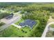 Stunning aerial view of a luxurious home nestled on a lush, expansive property at 1624 Turnbull Crossings Dr, New Smyrna Beach, FL 32168