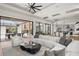 Open-concept living area with recessed lighting, and access to an outdoor kitchen and dining space at 1624 Turnbull Crossings Dr, New Smyrna Beach, FL 32168