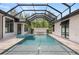 Enjoy this stunning screened-in pool with a spa for ultimate relaxation and outdoor fun at 1624 Turnbull Crossings Dr, New Smyrna Beach, FL 32168