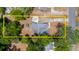 Overhead shot of property showing roof and large lot with mature trees and shed at 1718 Maryland Ave, Ormond Beach, FL 32174