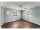 Cozy bedroom with hardwood floors, two windows offering lots of natural light at 1718 Maryland Ave, Ormond Beach, FL 32174