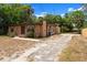 The home boasts unique stucco finishes, tidy landscaping and a long driveway with ample parking at 1718 Maryland Ave, Ormond Beach, FL 32174