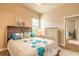 Bedroom with a full bed, bright window, and white dresser at 1734 Covendale Ln, Port Orange, FL 32128