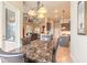 The dining room provides an open view to the kitchen and living area and is filled with light at 1734 Covendale Ln, Port Orange, FL 32128