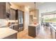 Bright kitchen with stainless steel appliances, white countertops and island, and natural lighting at 1734 Covendale Ln, Port Orange, FL 32128