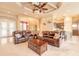 Living room featuring decorative ceilings and trim, large furnishings, and an open concept design at 1734 Covendale Ln, Port Orange, FL 32128
