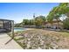Backyard with pool and pergola offers a relaxing and entertaining outdoor space at 1845 Willow Oak Dr, Edgewater, FL 32141