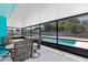Screened patio features a pool view, providing a refreshing view while relaxing outdoors at 1845 Willow Oak Dr, Edgewater, FL 32141
