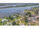Scenic aerial view capturing a waterfront homes and boat docks on the water at 1905 S Riverside Dr, Edgewater, FL 32141