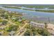Gorgeous aerial view showcasing waterfront homes with private docks at 1905 S Riverside Dr, Edgewater, FL 32141