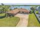 Stunning waterfront home with a private dock and lush landscaping at 1905 S Riverside Dr, Edgewater, FL 32141