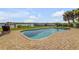 Inviting pool and spa set in a tranquil backyard, ideal for relaxation and entertaining at 1905 S Riverside Dr, Edgewater, FL 32141