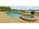 Enjoy outdoor living with this pool and hot tub in a private backyard overlooking the water at 1905 S Riverside Dr, Edgewater, FL 32141