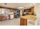 Well-equipped kitchen with stainless steel appliances, ample cabinet space, and a breakfast bar at 1905 S Riverside Dr, Edgewater, FL 32141