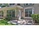 Inviting outdoor patio with stone paving, perfect for relaxation and entertaining with access to the house at 1999 Turnbull Lakes Dr, New Smyrna Beach, FL 32168