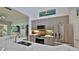 Modern kitchen with granite counters, stainless steel appliances, and decorative backsplash at 1999 Turnbull Lakes Dr, New Smyrna Beach, FL 32168