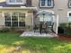 Paver patio features an outdoor dining area perfect for enjoying Florida's weather at 1999 Turnbull Lakes Dr, New Smyrna Beach, FL 32168