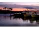 Fishing boats anchored at the pier at sunset at 1999 Turnbull Lakes Dr, New Smyrna Beach, FL 32168