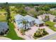 Expansive estate home with mature landscaping, paver drive, and golf course view in a desirable community at 2005 Country Club Dr, Port Orange, FL 32128