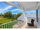 Overlook the manicured golf course from your tiled balcony with white railing at 2005 Country Club Dr, Port Orange, FL 32128