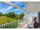 Relax on this balcony offering panoramic views of the golf course at 2005 Country Club Dr, Port Orange, FL 32128