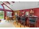 Relaxing bar area and game table with ample seating, perfect for entertaining guests at 2005 Country Club Dr, Port Orange, FL 32128