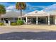 Exterior view of the Spruce Creek Country Club, a great amenity for residents at 2005 Country Club Dr, Port Orange, FL 32128