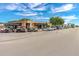 A commercial building boasts ample parking, retail space, outdoor seating, and high visibility in a bustling area at 2005 Country Club Dr, Port Orange, FL 32128