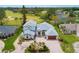 Expansive estate home with mature landscaping, paver drive, and golf course view in a desirable community at 2005 Country Club Dr, Port Orange, FL 32128