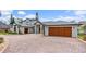 A luxury home with beautiful circular driveway, with a three-car garage at 2005 Country Club Dr, Port Orange, FL 32128
