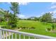 Scenic view overlooking a well-manicured golf course on a sunny day at 2005 Country Club Dr, Port Orange, FL 32128