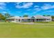 Beautiful view of the lush and well-maintained golf course at Spruce Creek Country Club at 2005 Country Club Dr, Port Orange, FL 32128