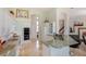 Well-lit kitchen showcasing light-colored cabinets, stone countertops, stainless steel appliances, and a breakfast bar at 2005 Country Club Dr, Port Orange, FL 32128