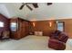 The home has a cozy seating area with built-in bookshelves, offering comfort and style at 2005 Country Club Dr, Port Orange, FL 32128
