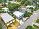 An aerial perspective presents a well-maintained home amid lush landscaping and adjacent properties at 216 Murray St, New Smyrna Beach, FL 32168